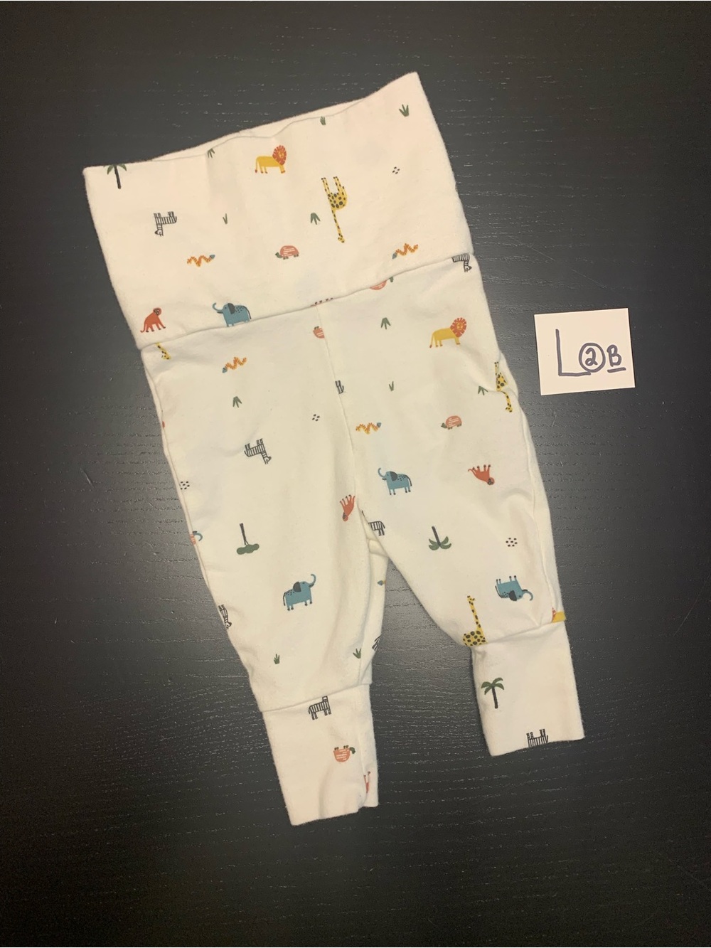 ⭐️2/$5.00⭐️ H&M 4-6m White Pants with Multicolor Safari Animal Print